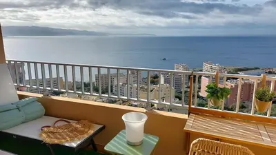a balcony with a view of the ocean at Studio AJACCIO Sanguinaires in Ajaccio