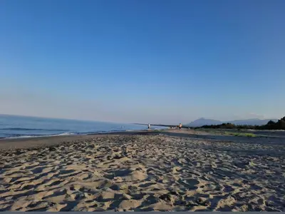 a sandy beach with the ocean in the background at T2 proche de la mer in Venzolasca