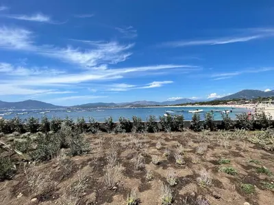 a view of a beach and a body of water at Rare T2 New, Waterfront in Porticcio