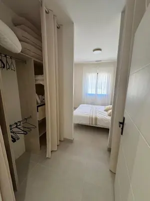 a small room with a bed and a window at Magnifique villa 4 chambres saint lucie de porto Vecchio in Zonza