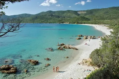 a group of people on a beach in the water at Corse villa sea view 180 AC 4 bedeooms sleeps 10 in Serra-di-Ferro