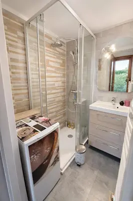 a bathroom with a shower and a sink at Mini-villa 4 personnes - Soléa 19 - vue mer in Serra-di-Ferro