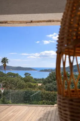 a view of the ocean from a balcony at Villa di Stella Pinarello - Proche plage - swimming pools in Sainte-Lucie de Porto-Vecchio