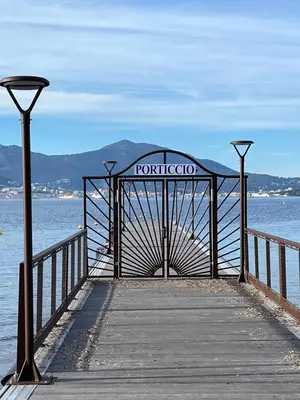 a pier with a sign that reads portico at Casa Alivu in Pietrosella