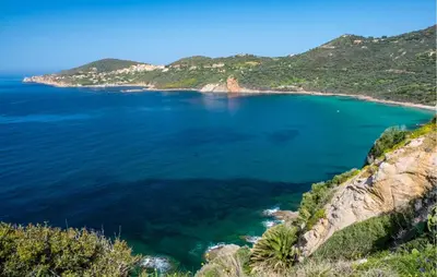 a view of the ocean from a cliff at Maison Typique De Village in Lopigna