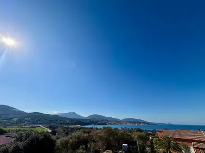 a view of the ocean from a house at Maison 4 chambres vue mer Jardin et plage à 1 min in Olmeto