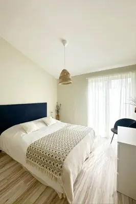 a living room with a couch and a table at Villa Tarabucetta by Interhome in Figari