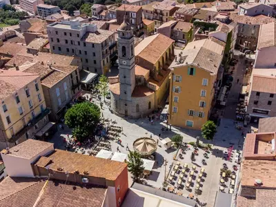 an aerial view of a city with a clock tower at Apartment La Boétie by Interhome in Porto-Vecchio