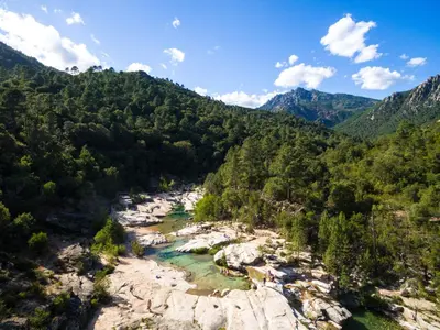 an aerial view of a river in the mountains at Apartment Bas Casa Blue by Interhome in Sainte-Lucie de Porto-Vecchio
