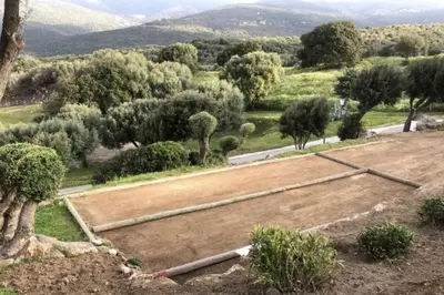 an aerial view of a field with trees and a road at Sublime Appartement neuf climatisé vue imprenable sur la mer terrasse wifi in Serra-di-Ferro