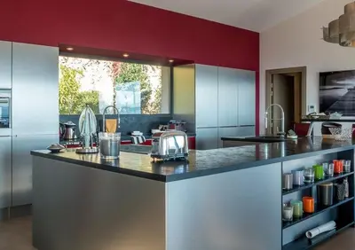 a kitchen with a counter with a sink and a counter sidx sidx sidx at Exclusive holiday home with pool in Porto-Vecchio