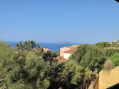a kitchen with a sink and a counter top at T1B 41 m2 sea view Îles Sanguinaires beaches within walking distance in Ajaccio