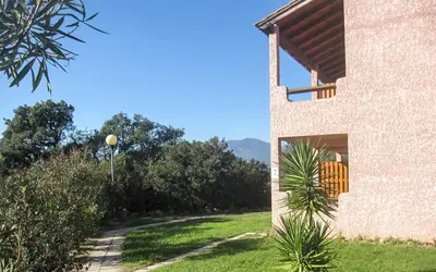 a view of a house from the yard at Complesso Residenziale Marina di Pinarello in Pinarellu