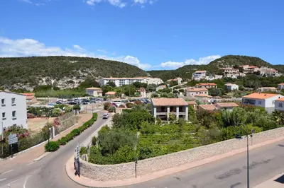 a view of a street in a small town at Hôtel A Madonetta in Bonifacio