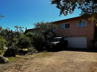 a truck parked in front of a house at Apartment Pioppa for 4 in Porto-Vecchio