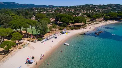 an overhead view of a beach with people in the water at Kallisterra in Sainte-Lucie de Porto-Vecchio