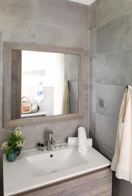 a bathroom with a sink and a mirror at Hôtel-Restaurant Marina Di Lava - Grand Ajaccio in Appietto