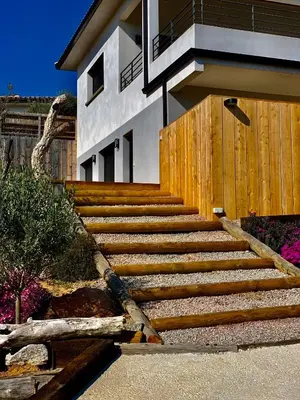 a set of stairs in front of a house at Senteurs du Maquis in Porticcio