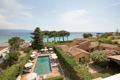 an aerial view of a villa with a swimming pool at Hôtel La Pinède in Ajaccio