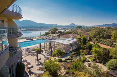 an aerial view of a resort with a swimming pool at Hotel Costa Salina in Porto-Vecchio