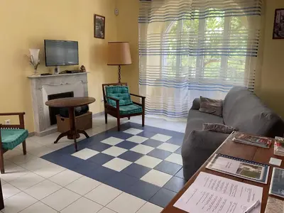 a living room with a couch and a fireplace at Casa Defranchi in Sant Andrea di Bozio