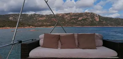 a couch sitting on the back of a boat at Ocean Yacht Trawler - Le Caloa in Porto-Vecchio