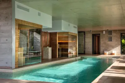an infinity pool in a house at Hôtel & Spa Version Maquis Citadelle in Bonifacio