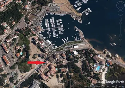 an aerial view of a marina with boats in the water at Corsappart in Porto-Vecchio