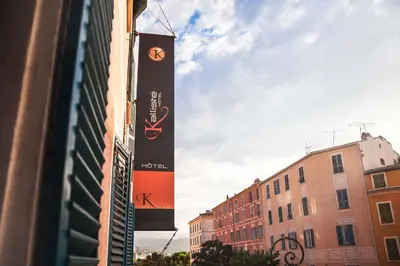 a sign on the side of a building at Kallisté in Ajaccio