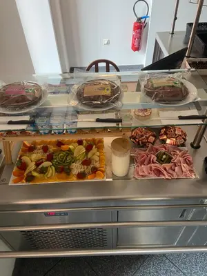 a buffet with many different types of food at Kallisté in Ajaccio