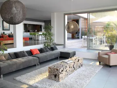 a living room with a couch and a table at Dililodge in Verghia