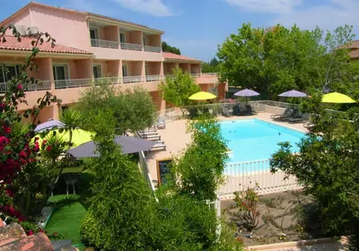 an aerial view of a hotel with a swimming pool at Hôtel Restaurant L' Empereur in Aléria