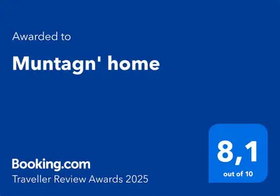 a blue sign with the text awaken to a kindergarten home at Muntagn' home in Corte