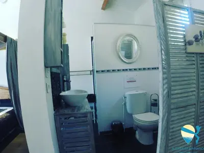 a small bathroom with a toilet and a sink at A Casa di Mariano in Alata