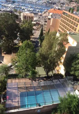 an overhead view of a building with two swimming pools at Castel Vecchio in Ajaccio