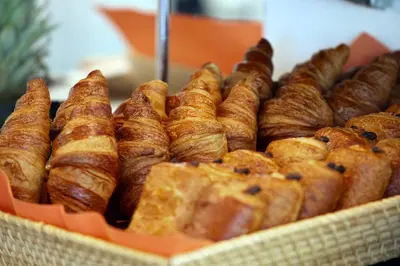 a display of pastries and croissants in a basket at Capo D'orto - Porto - Corse in Porto Ota