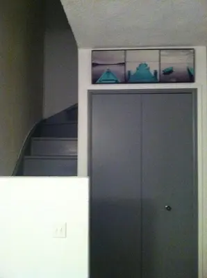 a cabinet in a room with a staircase at Mini-villa Vista bella in Porto-Vecchio