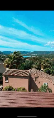 a view of a house with a roof at Mini-villa Vista bella in Porto-Vecchio