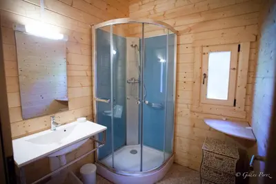a bathroom with a shower and a sink at Résidence Marina Livia in Serriera