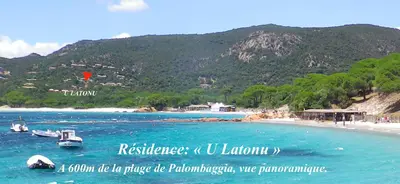 a picture of a beach with boats in the water at Résidence U LATONU - Palombaggia in Porto-Vecchio