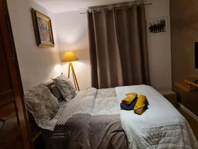 a bedroom with a bed with two bananas on it at A Sulana Chambre d'hôtes in Valle-di-Campoloro
