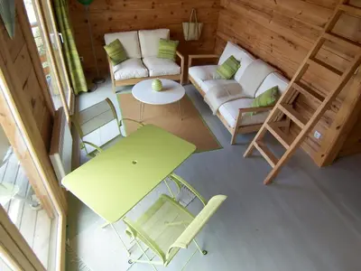 an overhead view of a living room with chairs and a table at Albaria Lodge in Saint-Florent
