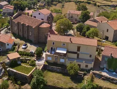 an aerial view of a house in a small town at indé no in Sari Solenzara