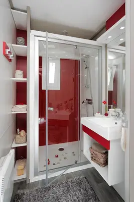a bathroom with a shower and a white sink at Camping Les Oliviers in Porto Ota