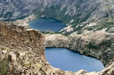 two large lakes in a rocky mountain side at Les Bergeries 