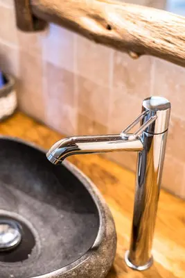 a bathroom with a sink and a toilet at Casa Lysandra in Serra-di-Ferro