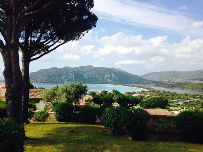 a view of a lake from a house at Villa Les Hameaux Di Santa Giulia in Porto-Vecchio
