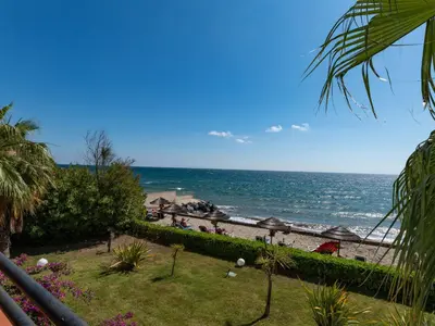 a view of the beach from the balcony of a resort at Apartment Casa Vecchi by Interhome in Moriani Plage