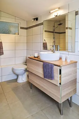 a bathroom with a sink and a toilet at Holiday Home Maison Gerard by Interhome in Cervione