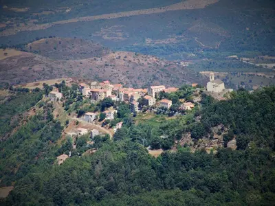 an aerial view of a house on a mountain at Auberge Casa Mathea in Poggio-di-Venaco